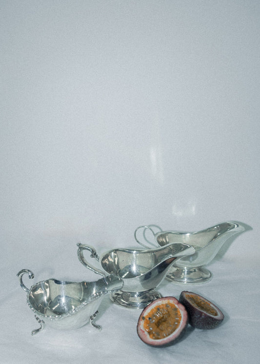 Vintage Silver Gravy Boat with Ornate Legs